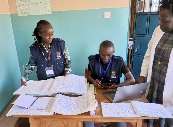 Dr. Jedidah Kiprop and colleagues work to verify data a first step in confirming an outbreak in progress